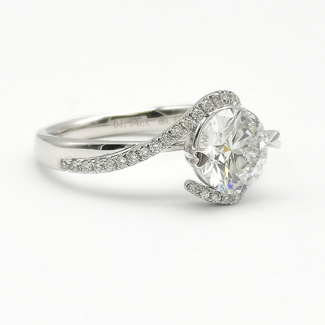 Two Claw Set Diamond Ring